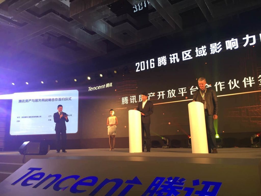 Tencent and Juwai announcing the partnership in Beijing. 